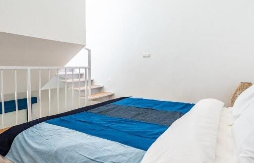 Modern 1BR Loft Mezzanine with a Vibrant Touch